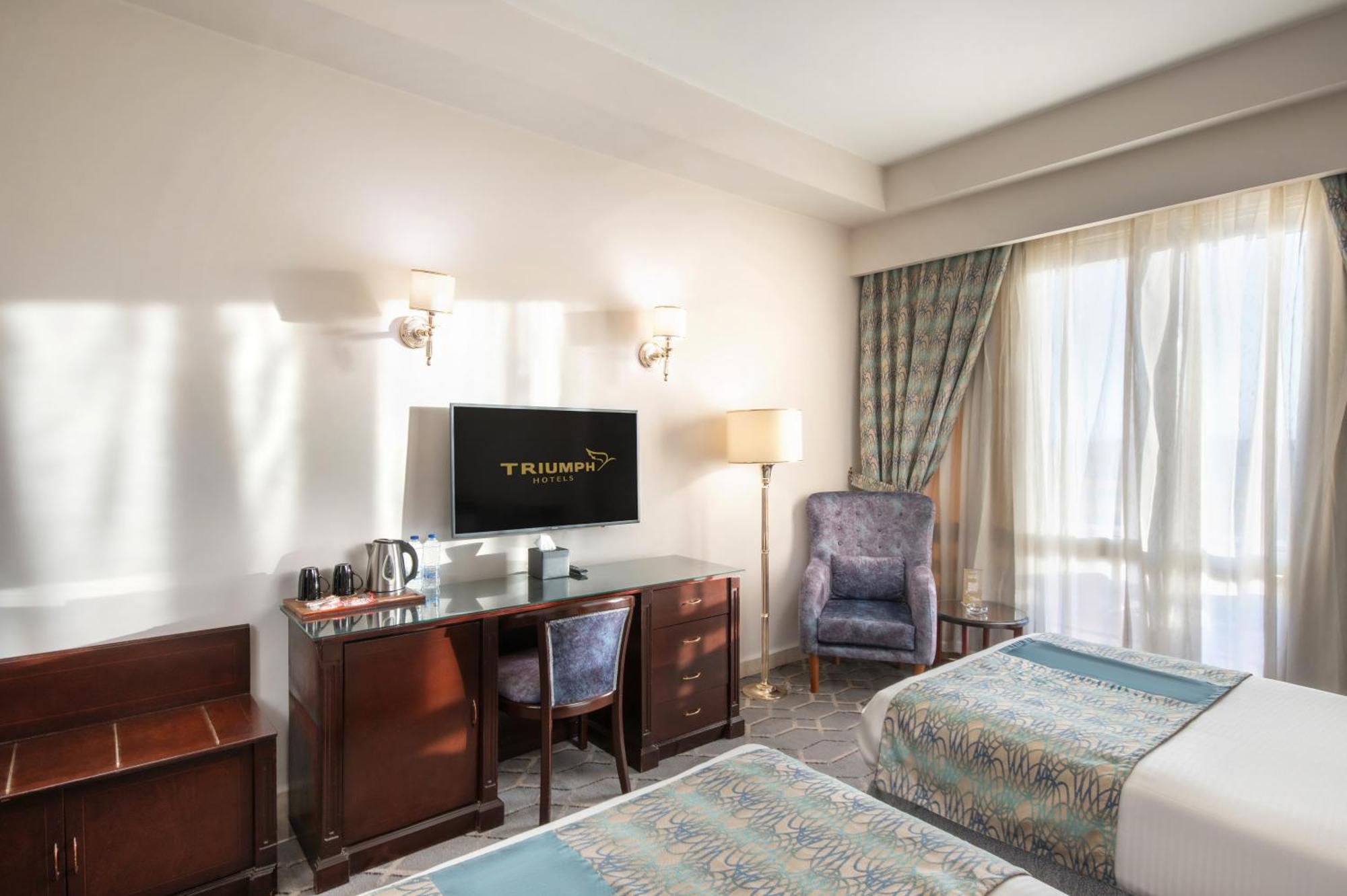Triumph Plaza Hotel Каир Номер фото